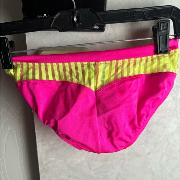 Pink/yellow Thin men’s Swimsuit. Size Small - Picture 2 of 3